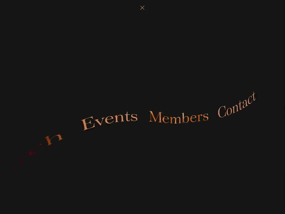 Copper serif words flowing along a curving line across a dark page.