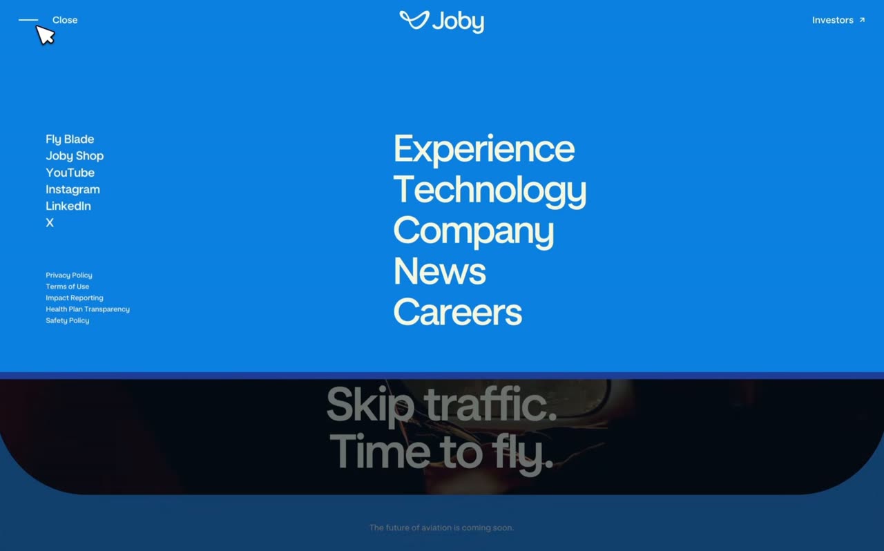 A rounded hero photo with headline, then a blue overlay dropping with large links (third-party brand shown in the preview).