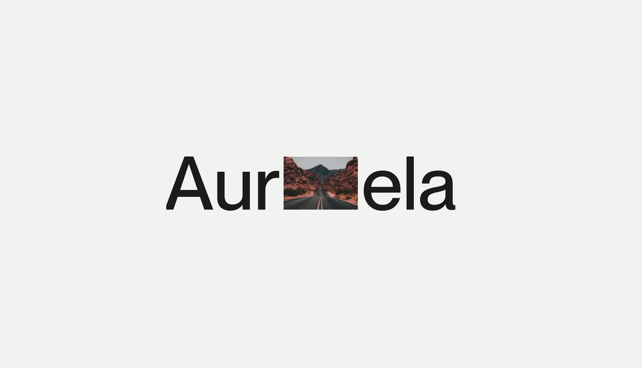 A dark wordmark on light grey splits to show a small landscape that expands into a full-screen beach photo.