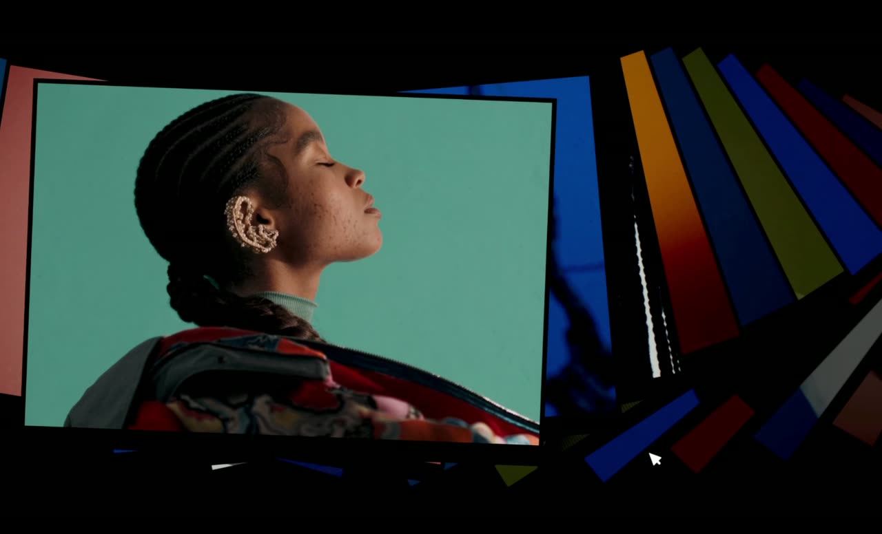 Portrait slides framed in front of a spinning fan of colorful cards on black.